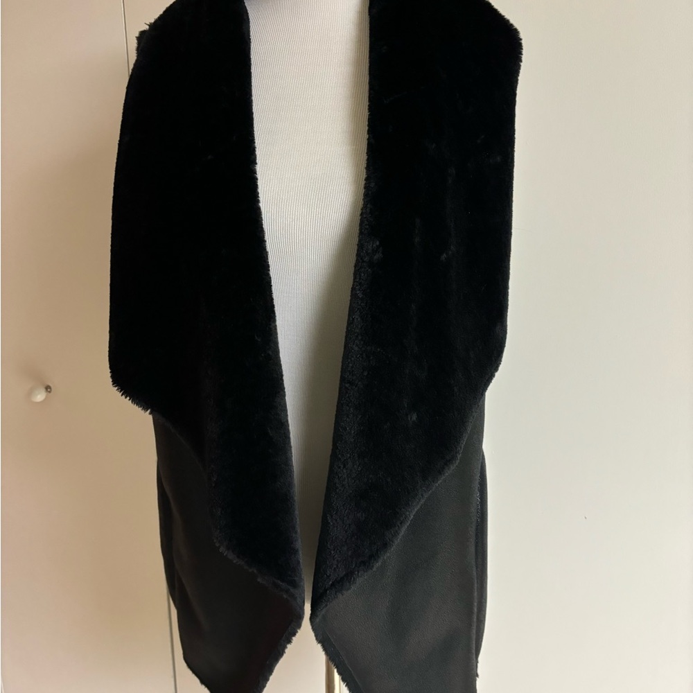 Faux leather vest with fur. Worn twice